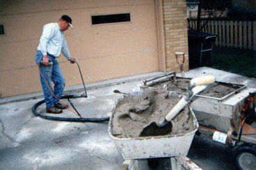 Commercial Concrete — Concrete Way With Grasses in New Berlin, WI Commercial Concrete — Concrete Way With Grasses in New Berlin, WI