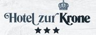 Ein Logo für das Hotel Zur Krone mit einer Krone und drei Sternen