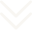 A blurry, white, symmetrical pattern resembling a stylized letter