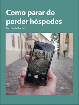 A person is holding a cell phone in their hand.