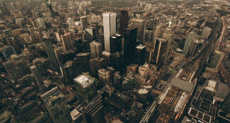 An aerial view of a large city with lots of tall buildings.