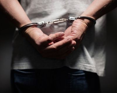 Criminal Law — Arrested Man in Handcuffs in Portsmouth, VA