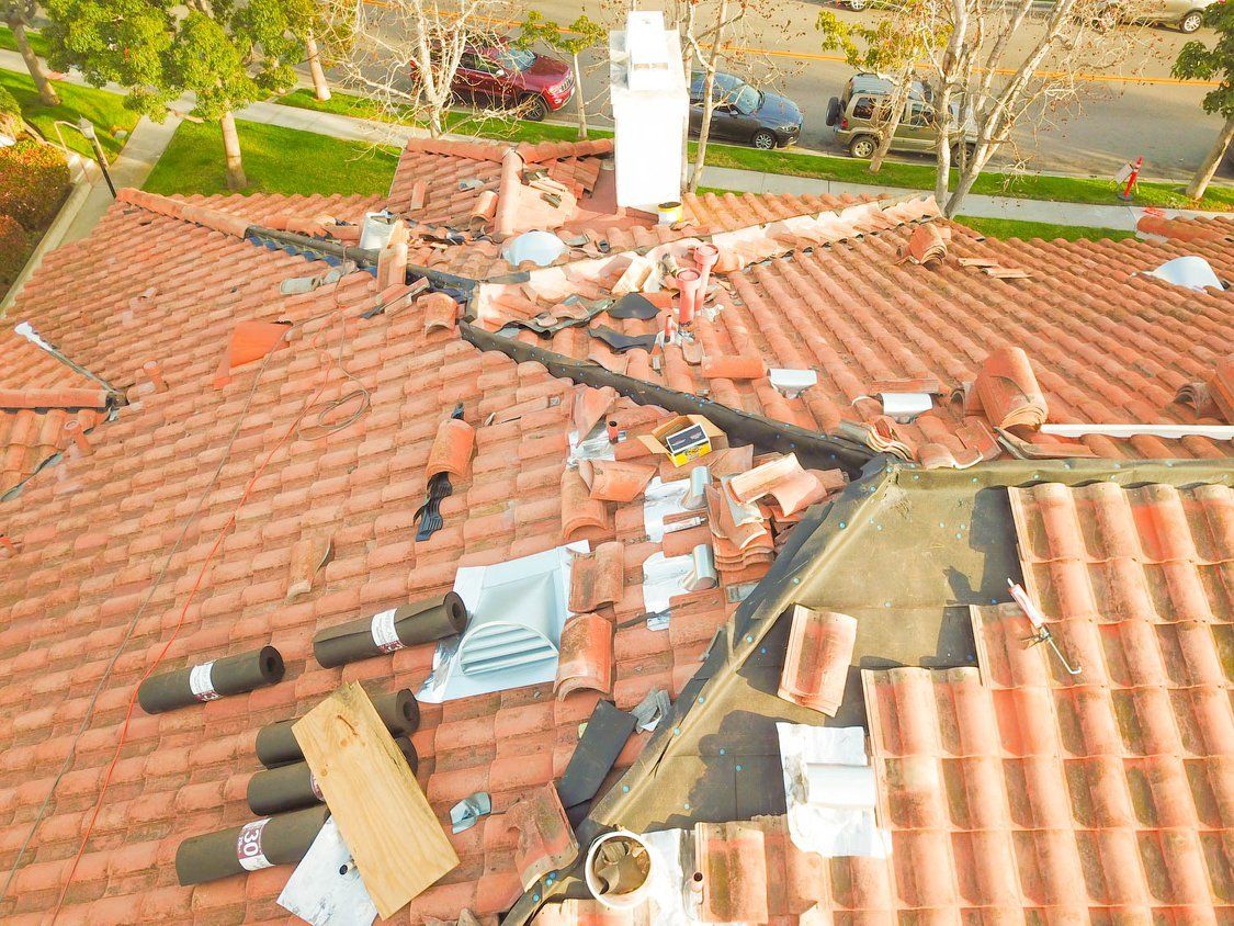 Residential Roof under Leak Repair