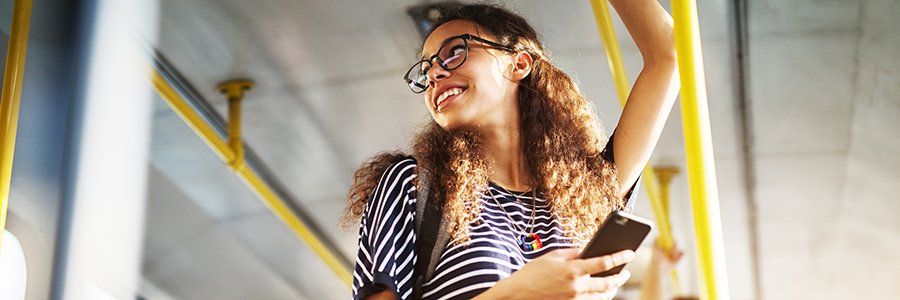 College student taking the bus | Red Brick Property Management LLC