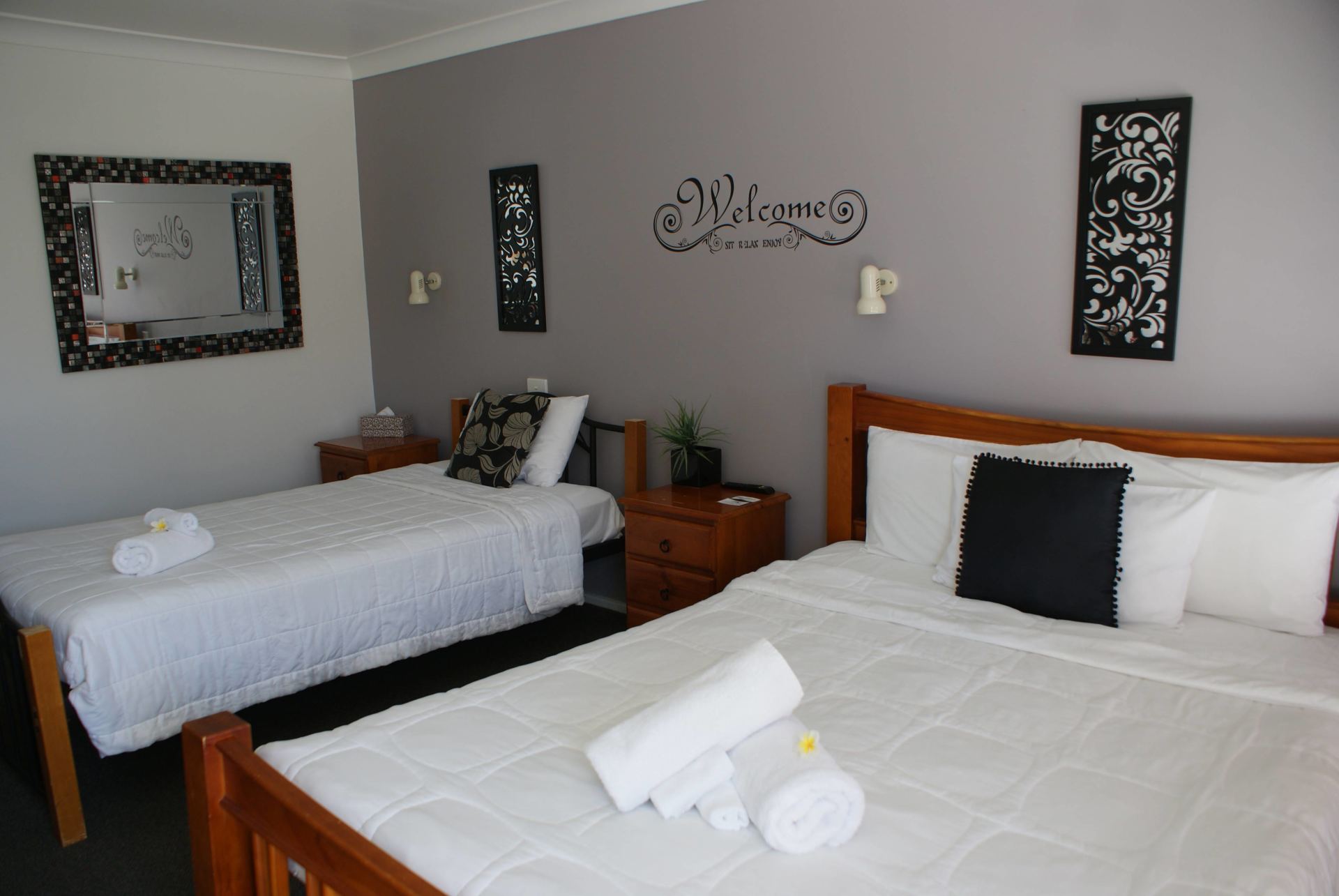 Twin Bed with Black Pillows