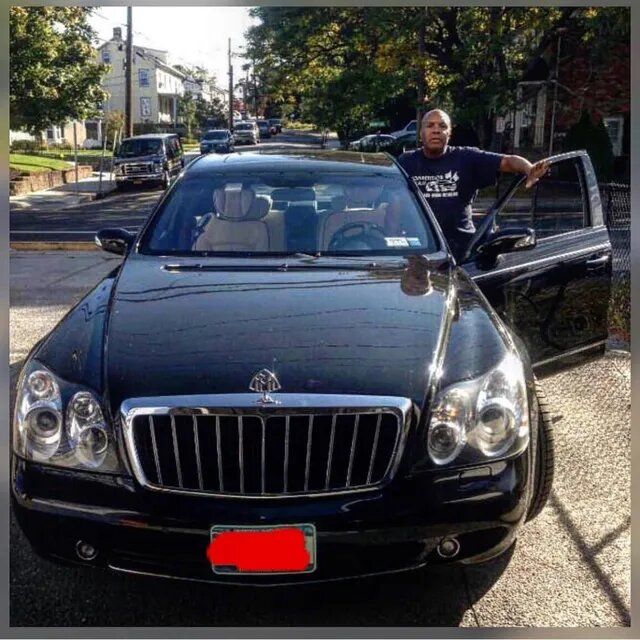Man Outside His Car — Port Washington, NY — Competition Glass Inc