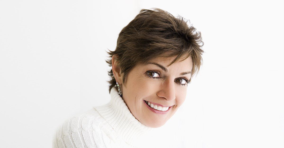 woman short hair smiling
