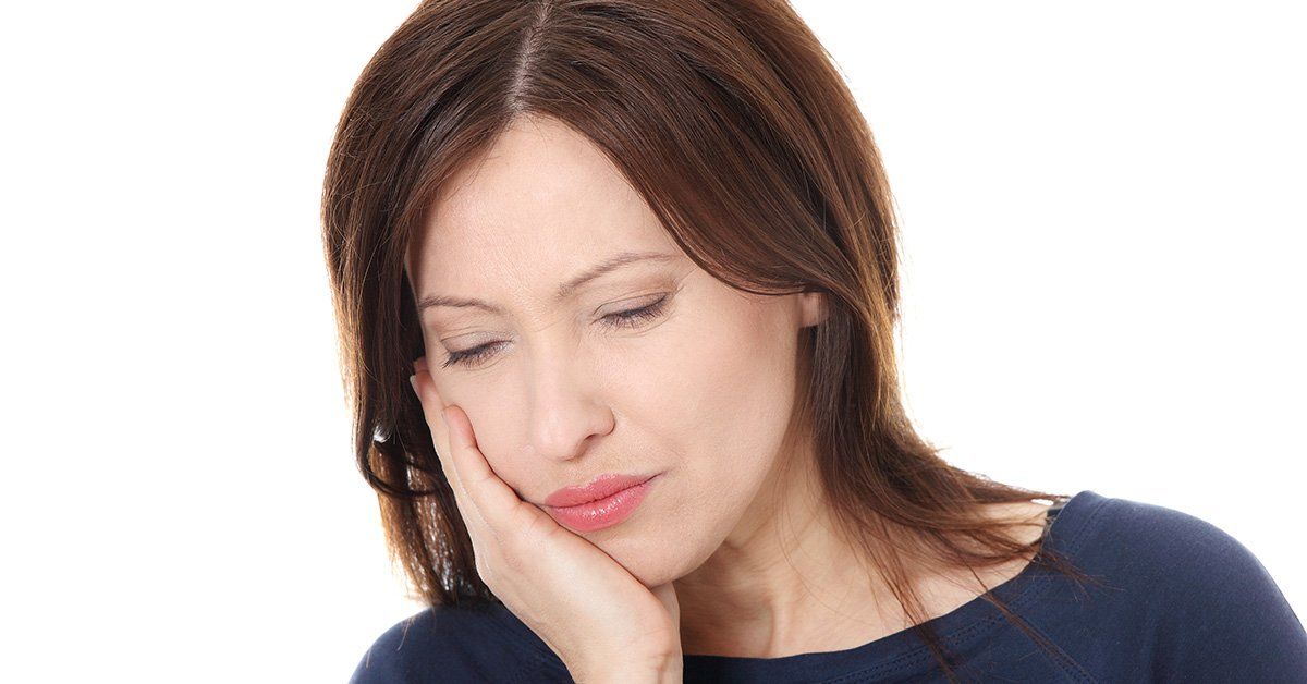 woman with tooth pain