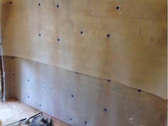 walls covered during a damp trreatment
