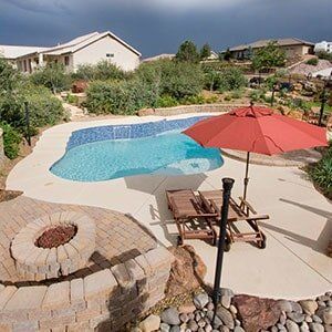 Pool with red umbrella in Sedona, AZ