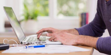man working on a laptop