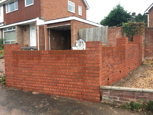 Garden wall being worked on
