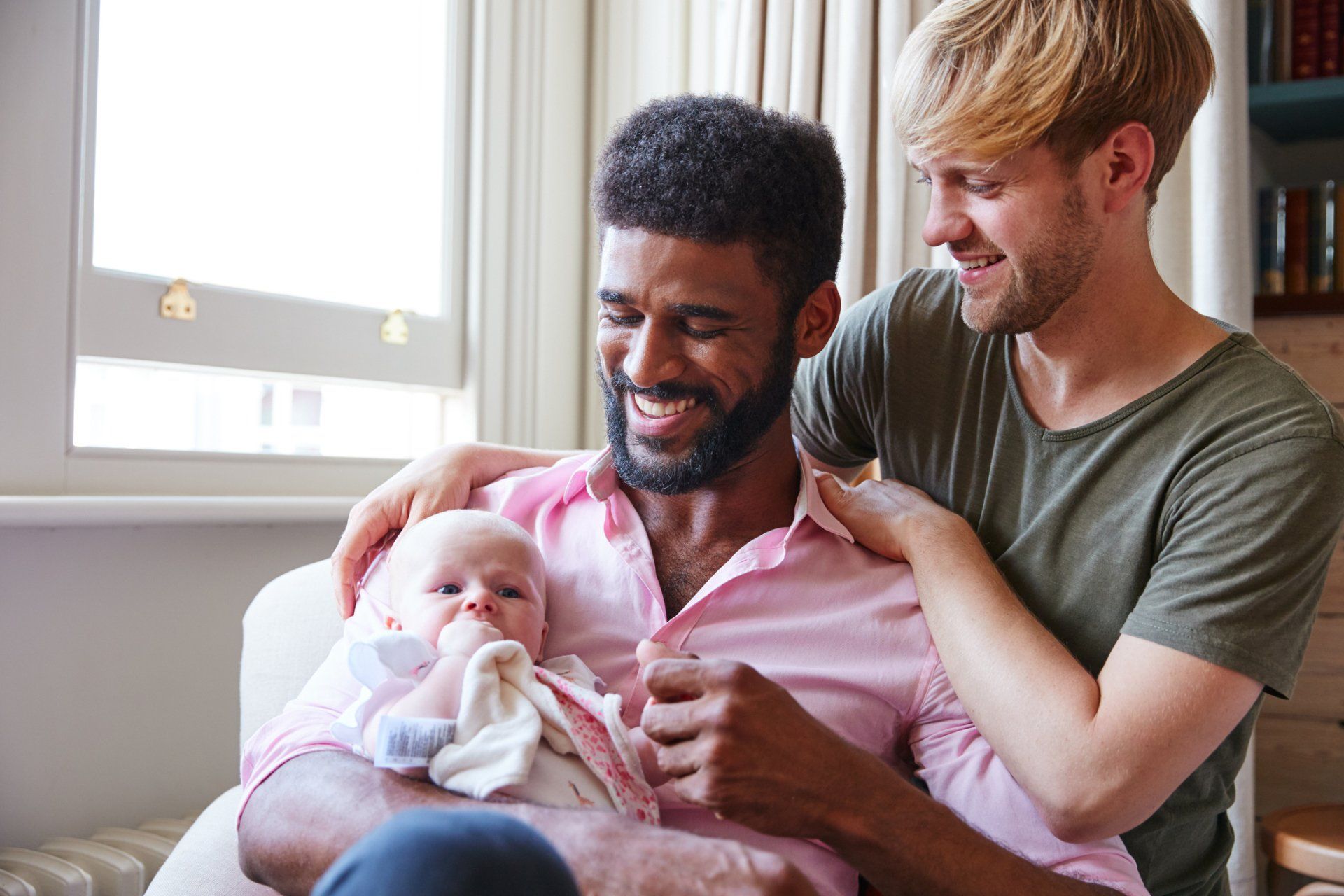 Attorney - Same Sex Couple Cuddling Baby in Belvidere, NJ