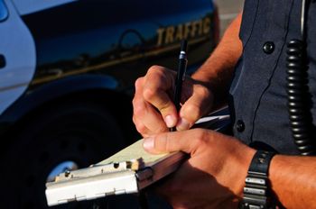 Traffic Tickets - A Police Officer Writing A Ticket in Belvidere, NJ Traffic Tickets - A Police Officer Writing A Ticket in Belvidere, NJ