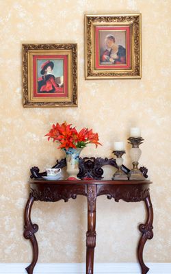 Side table with candles and flowers