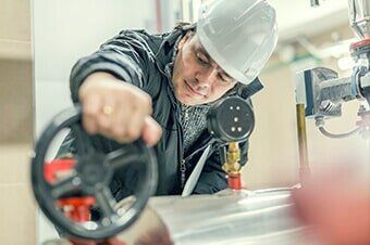 Plumber Inspecting Valve - Pump Contractor in Batavia, IL Plumber Inspecting Valve - Pump Contractor in Batavia, IL
