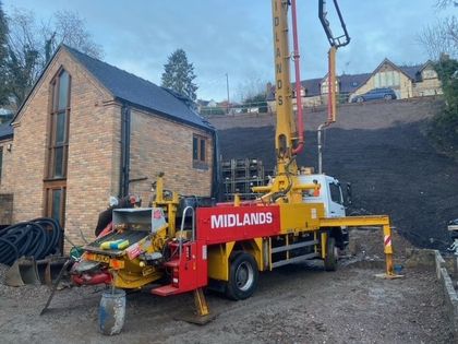 mixed concrete pouring at construction site