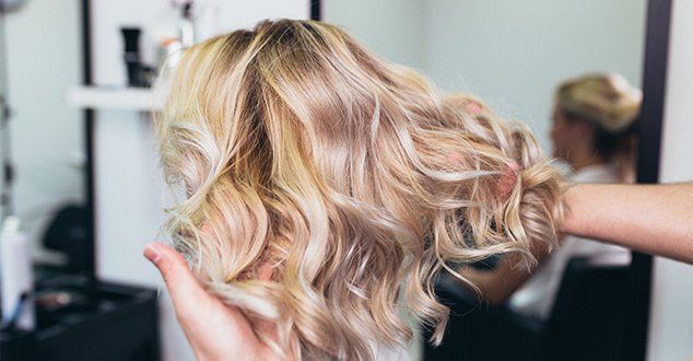 Hair Extensions — Blonde Curly Hair in South Fargo, ND