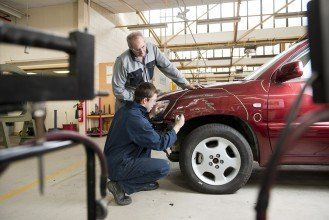Mechanics — Checking Damaged Automobile in Hyannis, MA Mechanics — Checking Damaged Automobile in Hyannis, MA