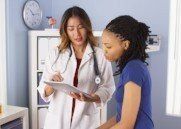 woman being examined by doctor