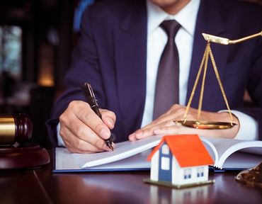 Lawyer And A House Model — Hartland, WI — Langer & Peterson LLC
