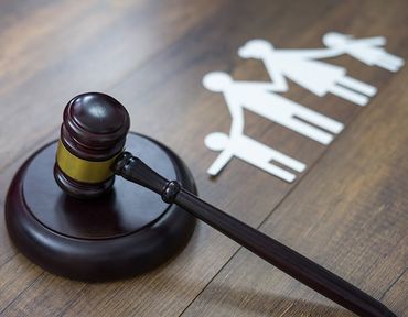 Family Figure And Gavel On Table — Hartland, WI — Langer & Peterson LLC