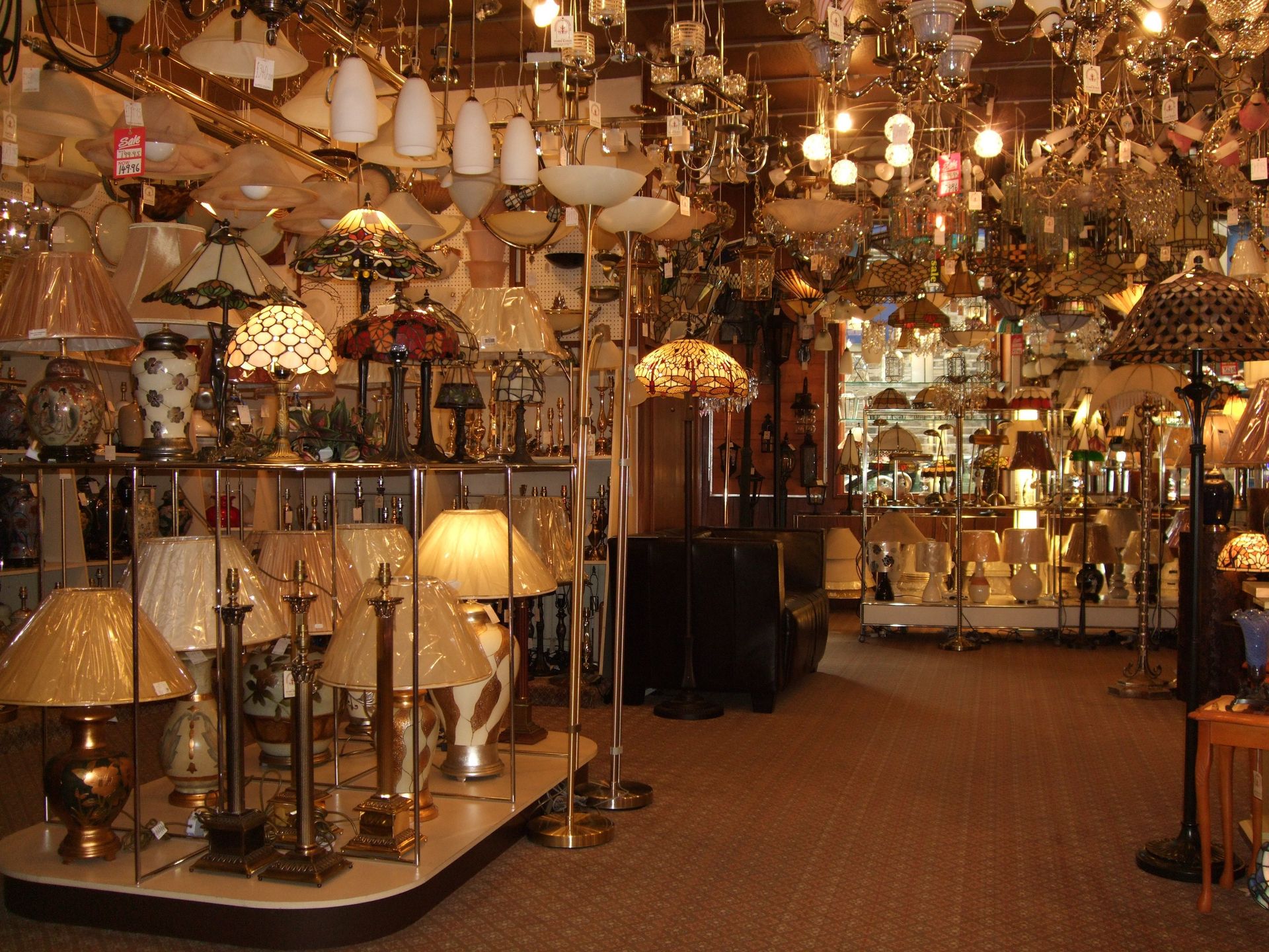A fantastic range of classic lighting in store Images of floor lights and wall lights in the showroom at Huddersfield