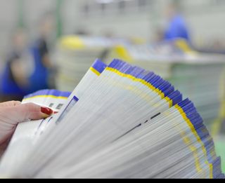 Real Estate Signs — Counting Printout Brochures in Birmingham, AL