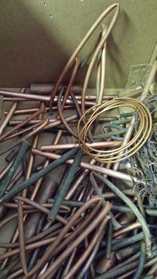 A pile of copper wire is sitting on top of a table.