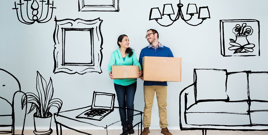 couple holding boxes