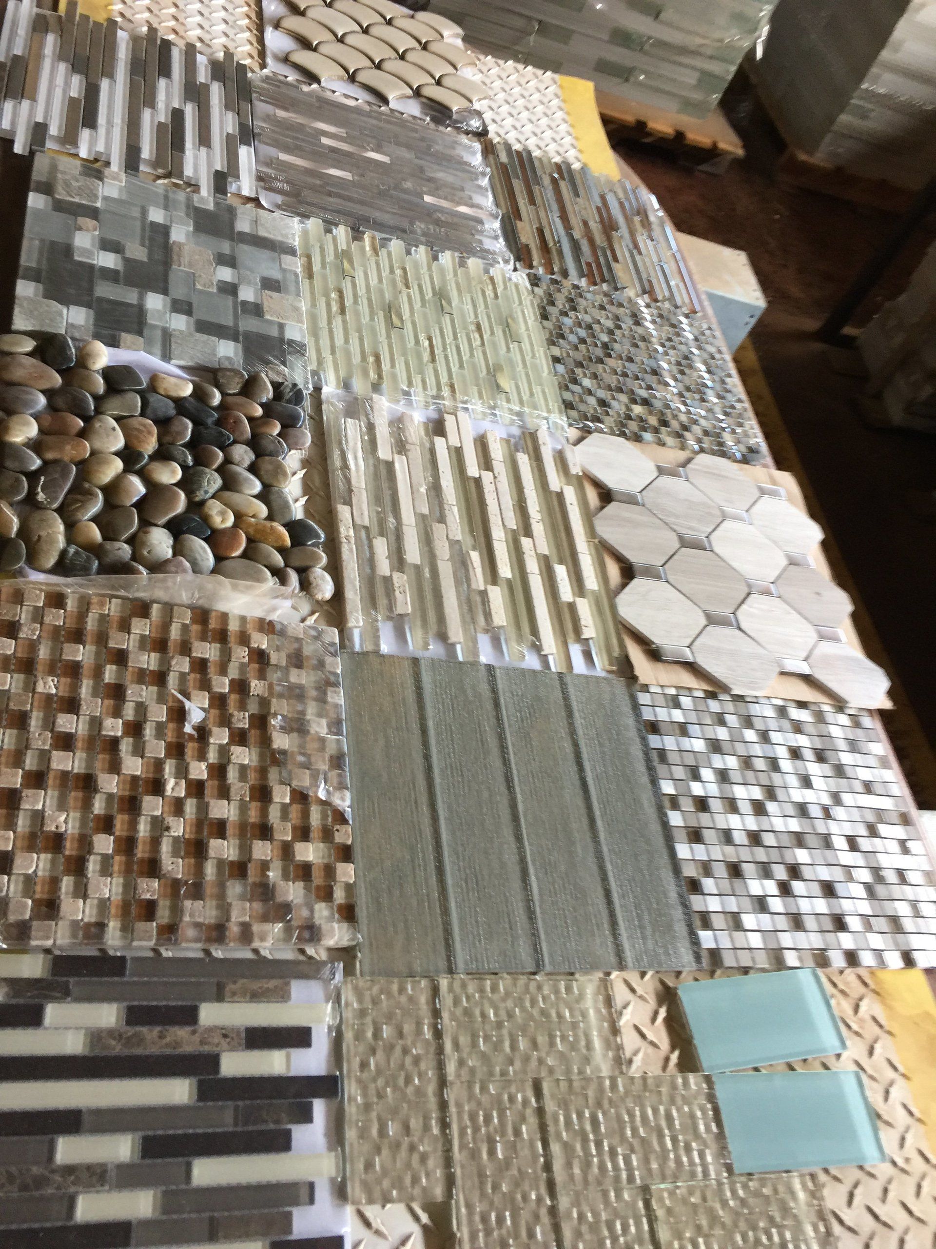 A table with a variety of tiles on it