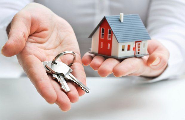 small house and keys