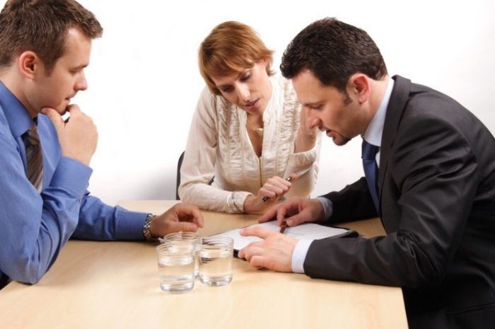 couple interacting with landlord