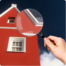house with magnifying glass