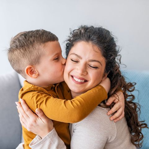 Kid Kissing Mom — Saginaw, MI — Swartz Adoption Agency Kid Kissing Mom — Saginaw, MI — Swartz Adoption Agency