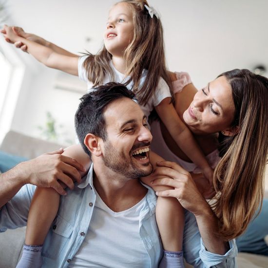Parents Playing with Their Daughter — Saginaw, MI — Swartz Adoption Agency Parents Playing with Their Daughter — Saginaw, MI — Swartz Adoption Agency