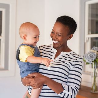 Parent Carrying Baby — Saginaw, MI — Swartz Adoption Agency