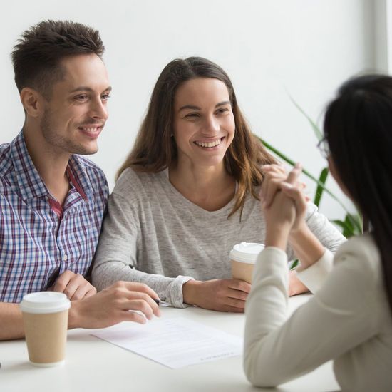 Couple Talking to a Social Worker — Saginaw, MI — Swartz Adoption Agency