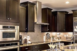Clean Sleek Kitchen With Nice Cabinets And Shelves — Wilmington, NC — The Cabinet Gallery Clean Sleek Kitchen With Nice Cabinets And Shelves — Wilmington, NC — The Cabinet Gallery