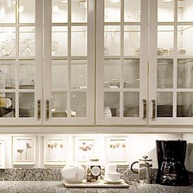 White Cabinets With Glass Panel Shelves — Wilmington, NC — The Cabinet Gallery White Cabinets With Glass Panel Shelves — Wilmington, NC — The Cabinet Gallery