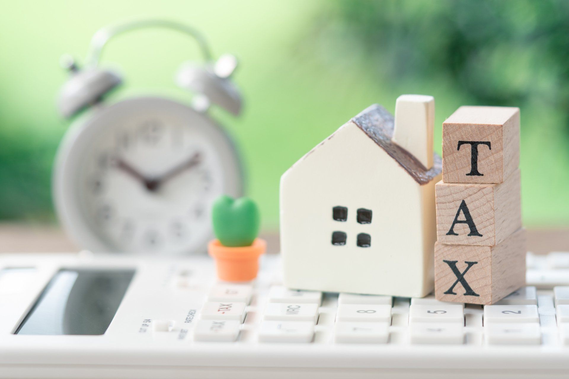 Calculator and House Model — Summerville, SC — Shepherd Law Firm, LLC