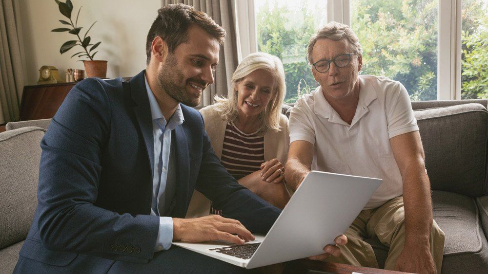 Active Senior Couple Discussing with Lawyer — Summerville, SC — Shepherd Law Firm, LLC Active Senior Couple Discussing with Lawyer — Summerville, SC — Shepherd Law Firm, LLC