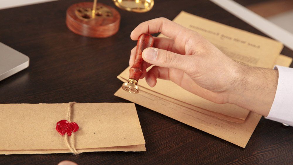 Male Lawyer Working with Contract Papers — Summerville, SC — Shepherd Law Firm, LLC