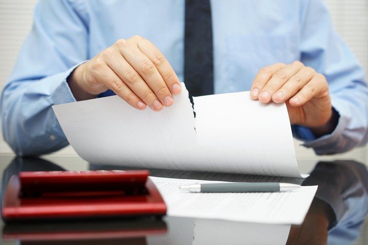 Man Tearing Up Paper — Summerville, SC — Shepherd Law Firm, LLC