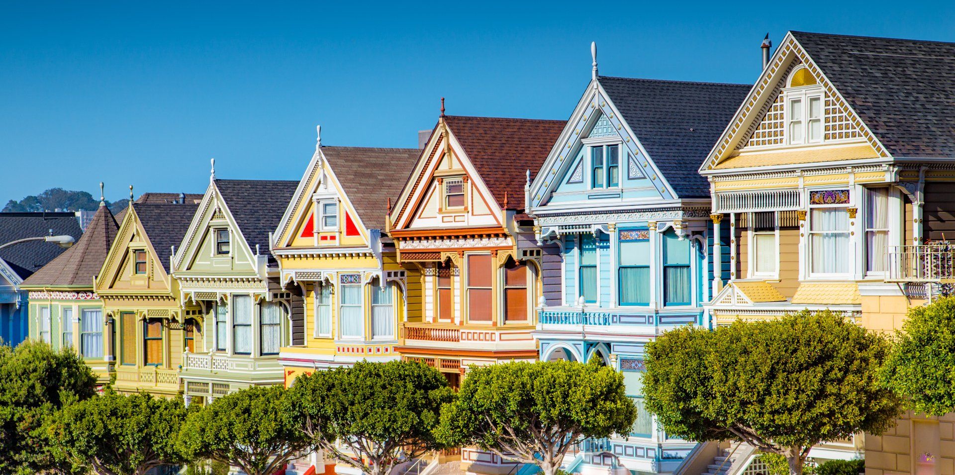 Row of Colorful Houses — San Francisco, CA — Atlas Painting Company Row of Colorful Houses — San Francisco, CA — Atlas Painting Company
