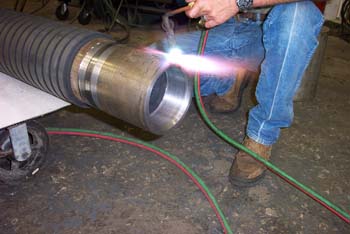 Best Roll Repair — Welding A Metal Roll in Mansfield, TX
