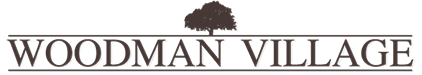 Woodman Village logo