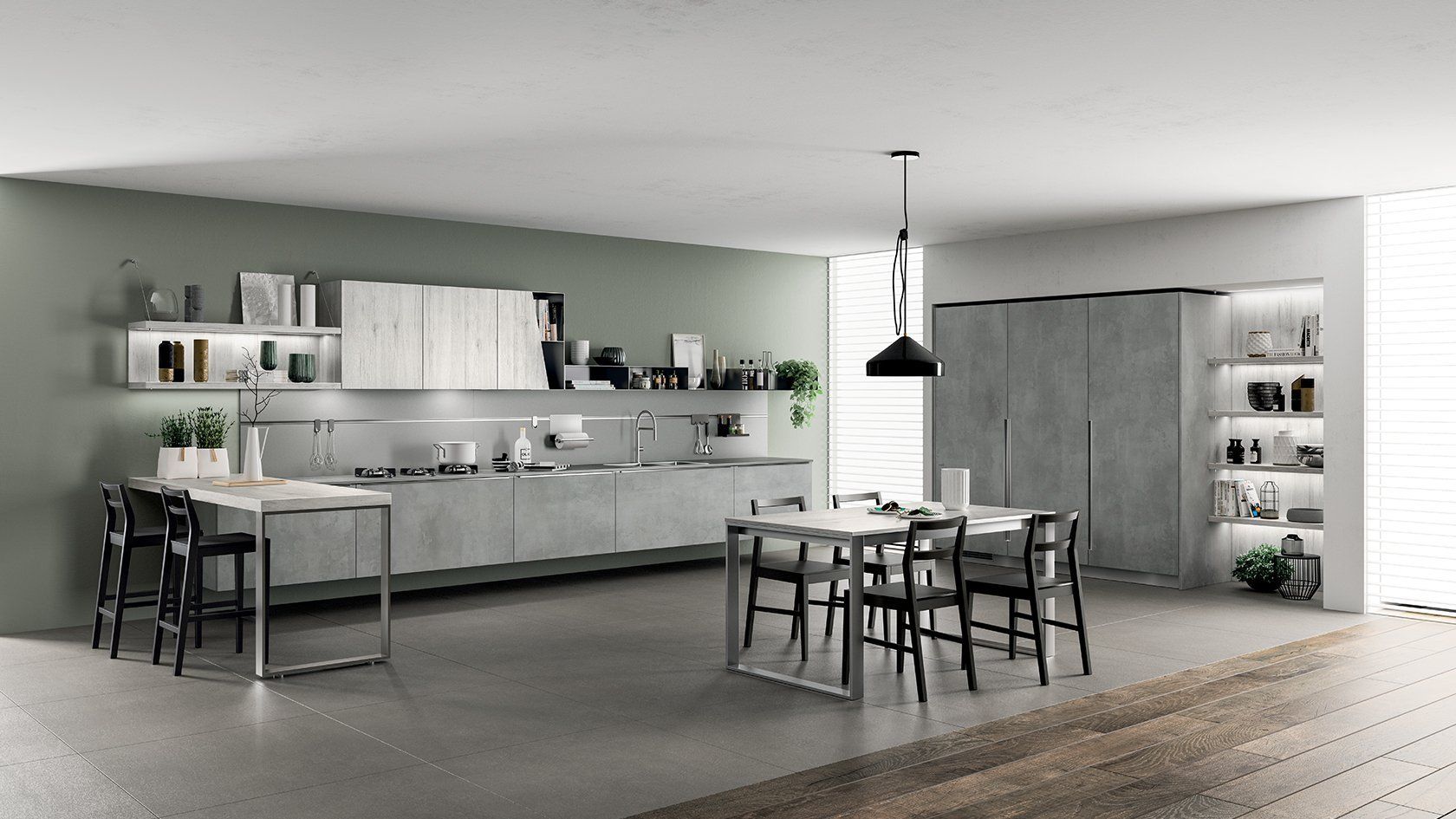 Cucina moderna con mobili grigio chiaro, tavolo da pranzo e parete decorativa verde.