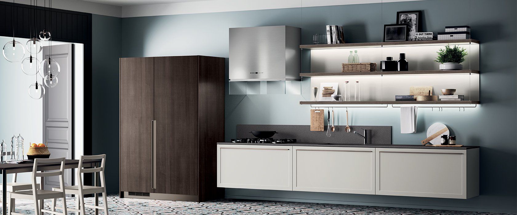 Cucina moderna con mobili chiari, armadio marrone scuro e pareti blu.