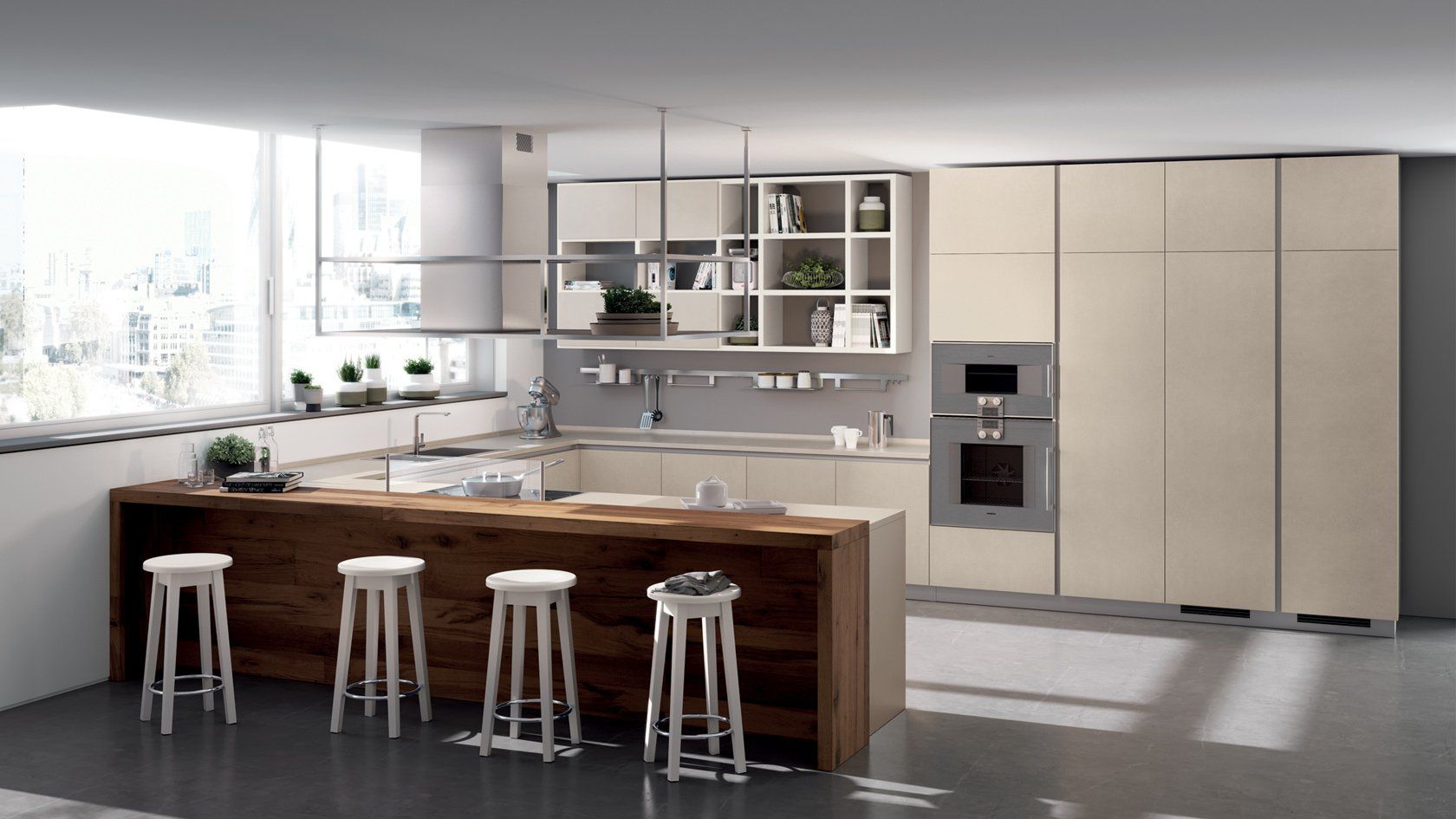 Cucina moderna con mobili beige, isola in legno con sgabelli ed elettrodomestici in acciaio inossidabile.
